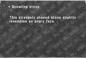 Scowling stone